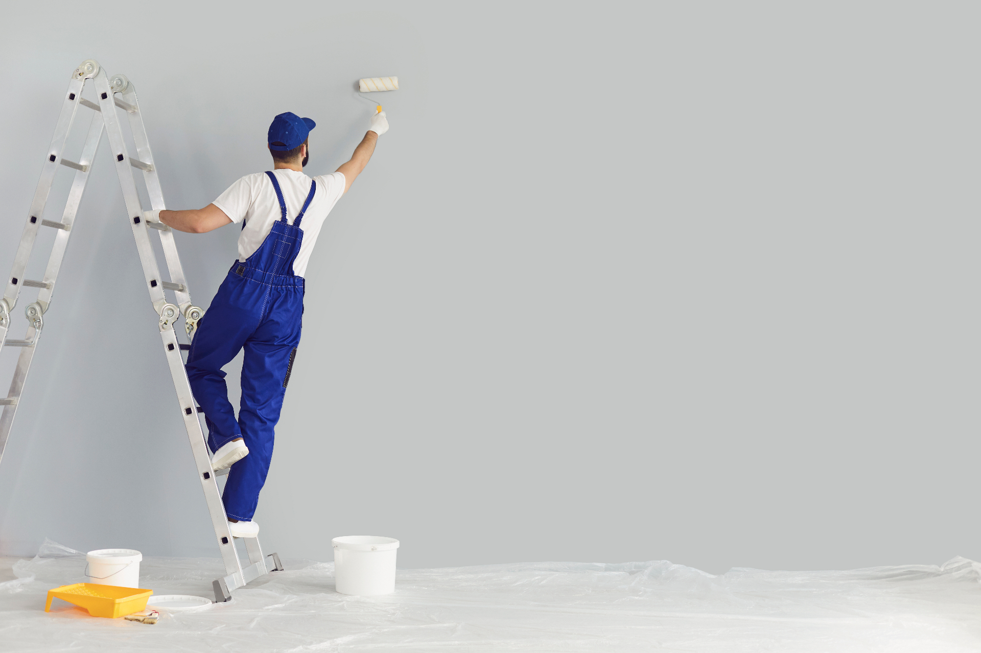 Professional painter from Pristine Painting at work
