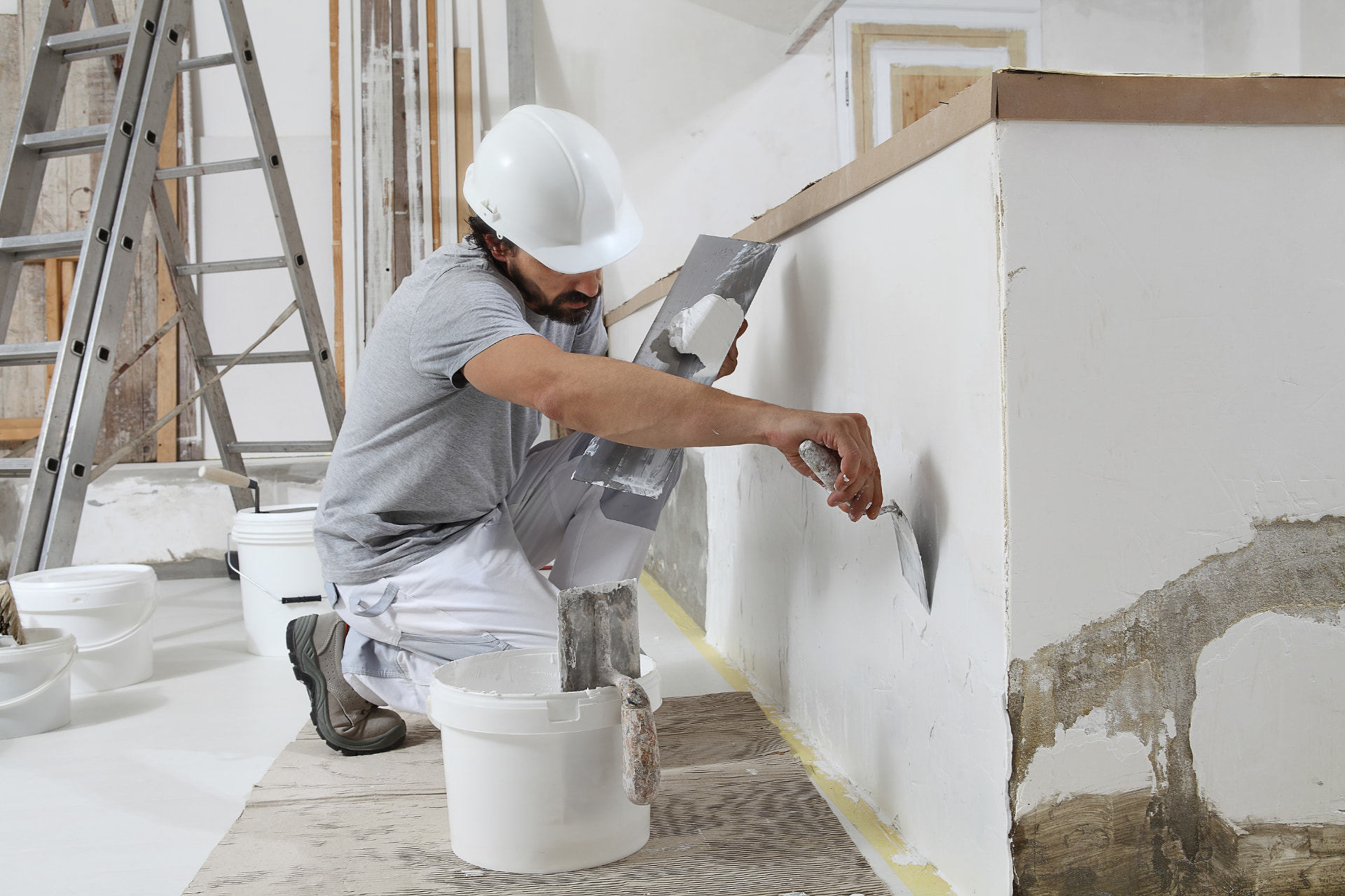 Wall prep and plastering before interior painting